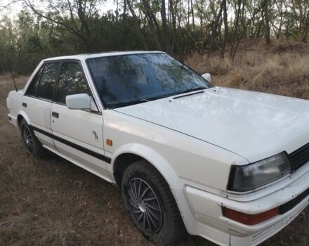 Белый Ниссан Блюберд, объемом двигателя 2 л и пробегом 387 тыс. км за 1200 $, фото 1 на Automoto.ua