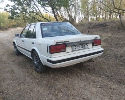 Белый Ниссан Блюберд, объемом двигателя 2 л и пробегом 387 тыс. км за 1200 $, фото 3 на Automoto.ua