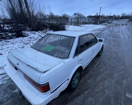 Белый Ниссан Блюберд, объемом двигателя 2 л и пробегом 341 тыс. км за 500 $, фото 1 на Automoto.ua