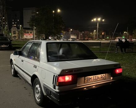 Белый Ниссан Блюберд, объемом двигателя 2 л и пробегом 300 тыс. км за 691 $, фото 2 на Automoto.ua