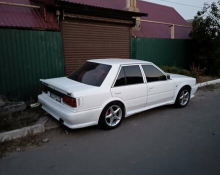 Білий Ніссан Блюберд, об'ємом двигуна 2 л та пробігом 500 тис. км за 2800 $, фото 2 на Automoto.ua