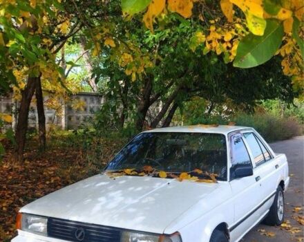 Белый Ниссан Блюберд, объемом двигателя 1.3 л и пробегом 135 тыс. км за 650 $, фото 5 на Automoto.ua