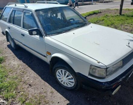 Белый Ниссан Блюберд, объемом двигателя 2 л и пробегом 300 тыс. км за 476 $, фото 2 на Automoto.ua