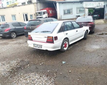 Белый Ниссан Блюберд, объемом двигателя 2 л и пробегом 500 тыс. км за 1000 $, фото 1 на Automoto.ua