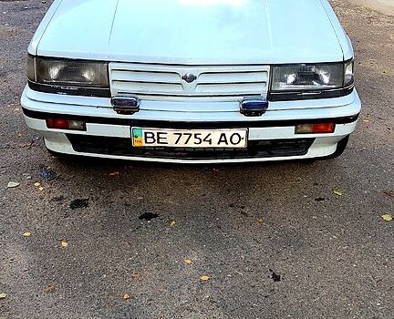 Белый Ниссан Блюберд, объемом двигателя 2 л и пробегом 400 тыс. км за 1200 $, фото 1 на Automoto.ua