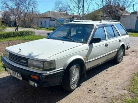 Белый Ниссан Блюберд, объемом двигателя 2 л и пробегом 300 тыс. км за 476 $, фото 1 на Automoto.ua