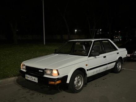 Белый Ниссан Блюберд, объемом двигателя 2 л и пробегом 300 тыс. км за 691 $, фото 1 на Automoto.ua