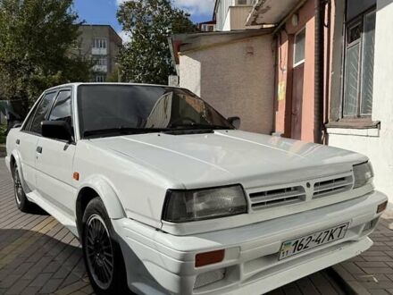 Ніссан Блюберд 1990 у Хмельницькому на Automoto.ua Білий Ніссан Блюберд, об'ємом двигуна 1.6 л та пробігом 350 тис. км за 1050 $, фото 1 на Automoto.ua