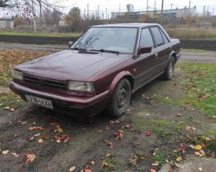 Красный Ниссан Блюберд, объемом двигателя 2 л и пробегом 40 тыс. км за 550 $, фото 2 на Automoto.ua