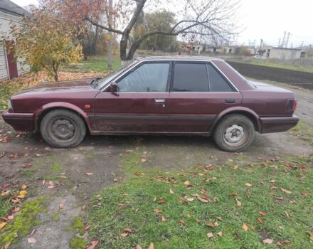 Красный Ниссан Блюберд, объемом двигателя 2 л и пробегом 40 тыс. км за 550 $, фото 1 на Automoto.ua