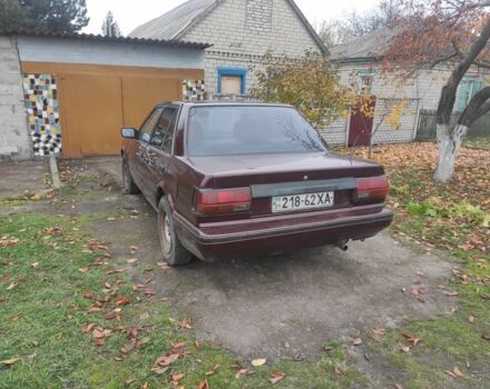 Красный Ниссан Блюберд, объемом двигателя 2 л и пробегом 40 тыс. км за 550 $, фото 3 на Automoto.ua