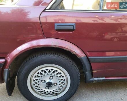 Красный Ниссан Блюберд, объемом двигателя 2 л и пробегом 455 тыс. км за 1700 $, фото 4 на Automoto.ua