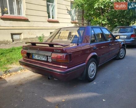 Красный Ниссан Блюберд, объемом двигателя 2 л и пробегом 455 тыс. км за 1700 $, фото 1 на Automoto.ua