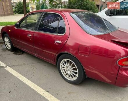 Червоний Ніссан Блюберд, об'ємом двигуна 2 л та пробігом 310 тис. км за 2000 $, фото 6 на Automoto.ua