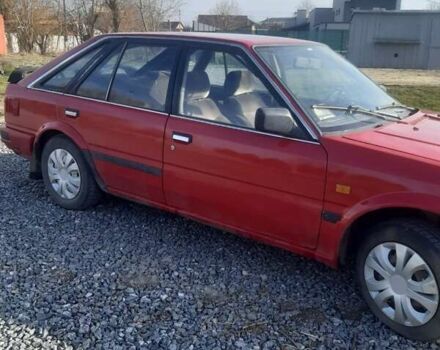 Червоний Ніссан Блюберд, об'ємом двигуна 2 л та пробігом 315 тис. км за 1450 $, фото 9 на Automoto.ua