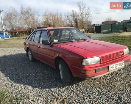 Червоний Ніссан Блюберд, об'ємом двигуна 2 л та пробігом 315 тис. км за 1450 $, фото 3 на Automoto.ua