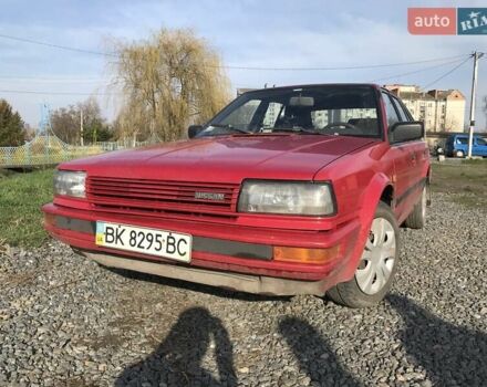 Червоний Ніссан Блюберд, об'ємом двигуна 2 л та пробігом 315 тис. км за 1450 $, фото 2 на Automoto.ua