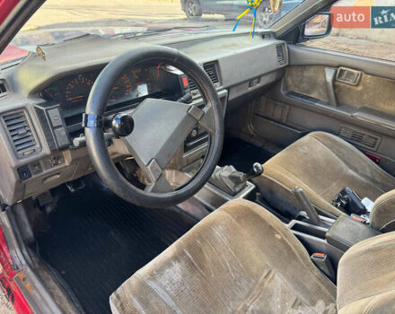 Красный Ниссан Блюберд, объемом двигателя 2 л и пробегом 300 тыс. км за 550 $, фото 6 на Automoto.ua