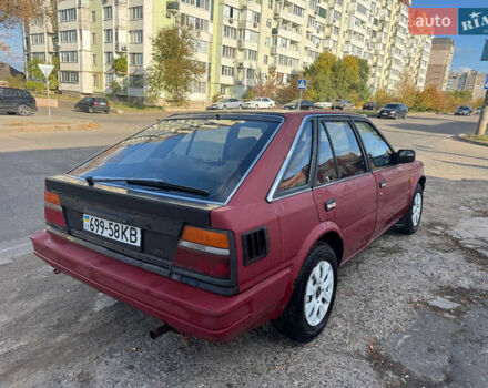 Красный Ниссан Блюберд, объемом двигателя 2 л и пробегом 300 тыс. км за 550 $, фото 3 на Automoto.ua