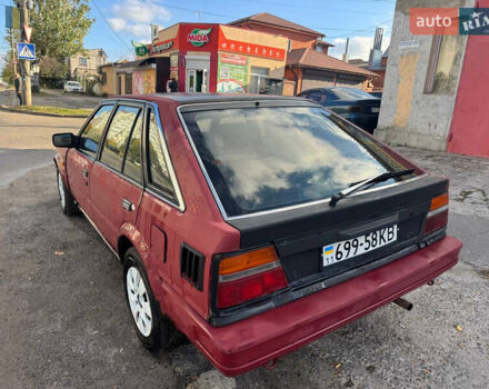 Красный Ниссан Блюберд, объемом двигателя 2 л и пробегом 300 тыс. км за 550 $, фото 4 на Automoto.ua