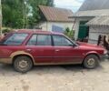 Красный Ниссан Блюберд, объемом двигателя 2 л и пробегом 300 тыс. км за 409 $, фото 3 на Automoto.ua