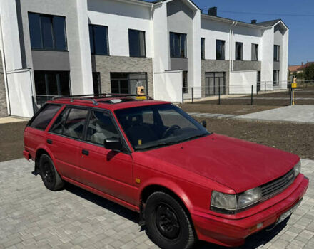 Красный Ниссан Блюберд, объемом двигателя 2 л и пробегом 400 тыс. км за 1000 $, фото 1 на Automoto.ua