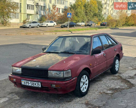 Красный Ниссан Блюберд, объемом двигателя 2 л и пробегом 300 тыс. км за 550 $, фото 1 на Automoto.ua