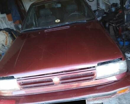 Красный Ниссан Блюберд, объемом двигателя 2 л и пробегом 196 тыс. км за 1700 $, фото 1 на Automoto.ua