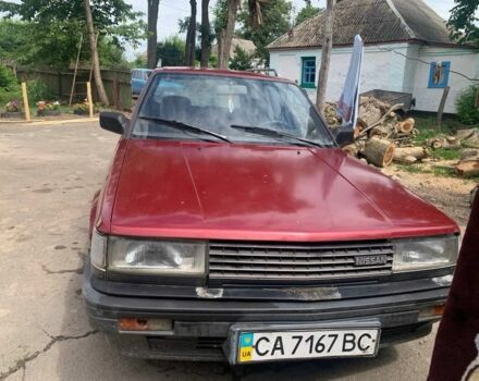 Червоний Ніссан Блюберд, об'ємом двигуна 2 л та пробігом 300 тис. км за 409 $, фото 1 на Automoto.ua