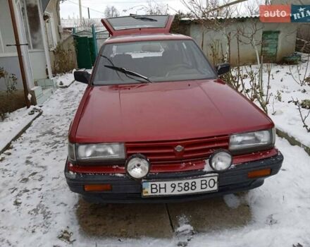 Червоний Ніссан Блюберд, об'ємом двигуна 1.8 л та пробігом 100 тис. км за 900 $, фото 1 на Automoto.ua