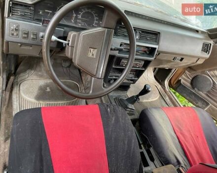 Желтый Ниссан Блюберд, объемом двигателя 2 л и пробегом 130 тыс. км за 900 $, фото 2 на Automoto.ua