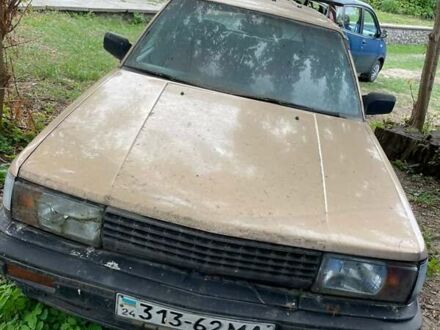 Желтый Ниссан Блюберд, объемом двигателя 2 л и пробегом 130 тыс. км за 900 $, фото 1 на Automoto.ua