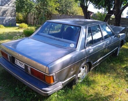 Серый Ниссан Блюберд, объемом двигателя 1.8 л и пробегом 160 тыс. км за 571 $, фото 2 на Automoto.ua