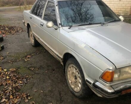 Серый Ниссан Блюберд, объемом двигателя 1.8 л и пробегом 75 тыс. км за 450 $, фото 2 на Automoto.ua