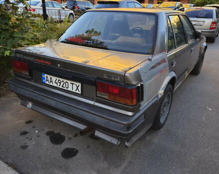 Серый Ниссан Блюберд, объемом двигателя 2 л и пробегом 300 тыс. км за 750 $, фото 3 на Automoto.ua