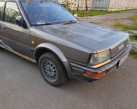 Серый Ниссан Блюберд, объемом двигателя 2 л и пробегом 300 тыс. км за 750 $, фото 1 на Automoto.ua