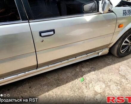 Серый Ниссан Блюберд, объемом двигателя 2 л и пробегом 250 тыс. км за 650 $, фото 5 на Automoto.ua