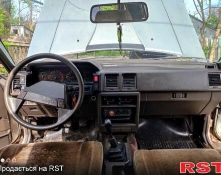 Серый Ниссан Блюберд, объемом двигателя 2 л и пробегом 250 тыс. км за 650 $, фото 3 на Automoto.ua