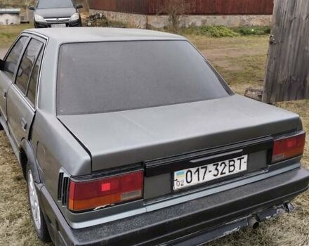 Сірий Ніссан Блюберд, об'ємом двигуна 2 л та пробігом 327 тис. км за 1800 $, фото 4 на Automoto.ua