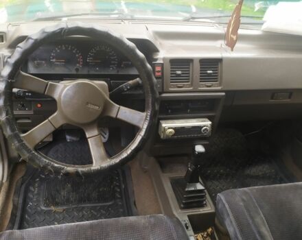 Серый Ниссан Блюберд, объемом двигателя 2 л и пробегом 500 тыс. км за 0 $, фото 1 на Automoto.ua