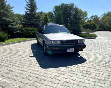 Сірий Ніссан Блюберд, об'ємом двигуна 2 л та пробігом 250 тис. км за 2000 $, фото 1 на Automoto.ua