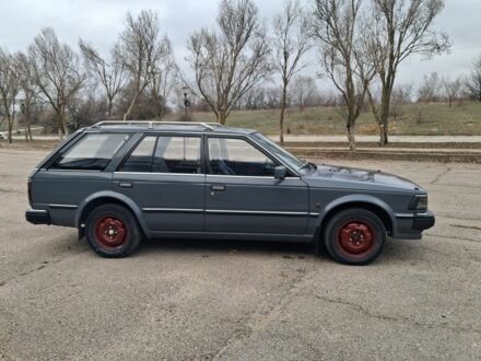 Серый Ниссан Блюберд, объемом двигателя 2 л и пробегом 583 тыс. км за 1200 $, фото 1 на Automoto.ua