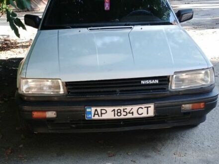 Серый Ниссан Блюберд, объемом двигателя 2 л и пробегом 370 тыс. км за 600 $, фото 1 на Automoto.ua