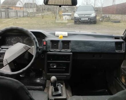 Сірий Ніссан Блюберд, об'ємом двигуна 2 л та пробігом 327 тис. км за 1800 $, фото 1 на Automoto.ua