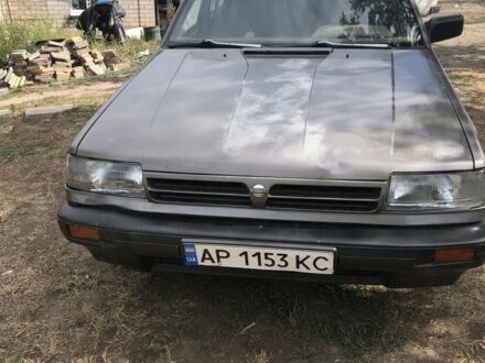 Сірий Ніссан Блюберд, об'ємом двигуна 1.6 л та пробігом 444 тис. км за 41000 $, фото 1 на Automoto.ua