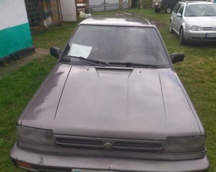 Серый Ниссан Блюберд, объемом двигателя 2 л и пробегом 500 тыс. км за 1000 $, фото 1 на Automoto.ua