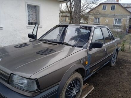 Ніссан Блюберд 1993 у Млынове на Automoto.ua Сірий Ніссан Блюберд, об'ємом двигуна 2 л та пробігом 500 тис. км за 1000 $, фото 1 на Automoto.ua