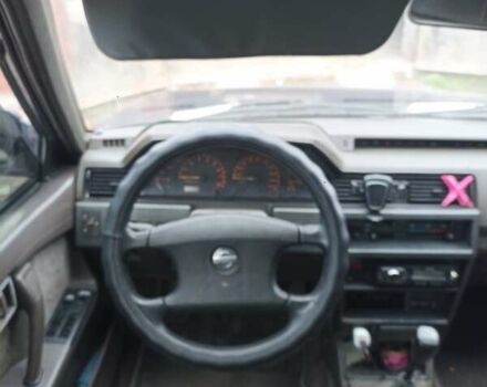 Синій Ніссан Блюберд, об'ємом двигуна 2 л та пробігом 145 тис. км за 2000 $, фото 4 на Automoto.ua