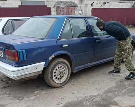 Синий Ниссан Блюберд, объемом двигателя 2 л и пробегом 108 тыс. км за 450 $, фото 5 на Automoto.ua