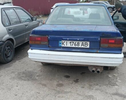 Синий Ниссан Блюберд, объемом двигателя 2 л и пробегом 108 тыс. км за 450 $, фото 4 на Automoto.ua